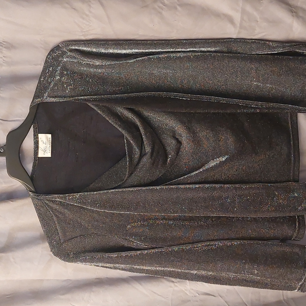 Holiday ready..beautiful black sparkle blouse